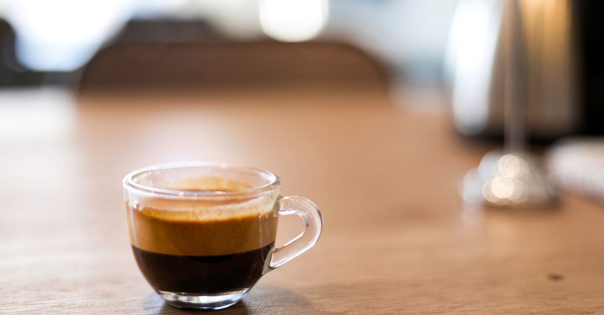 A close-up of a cup of black coffee